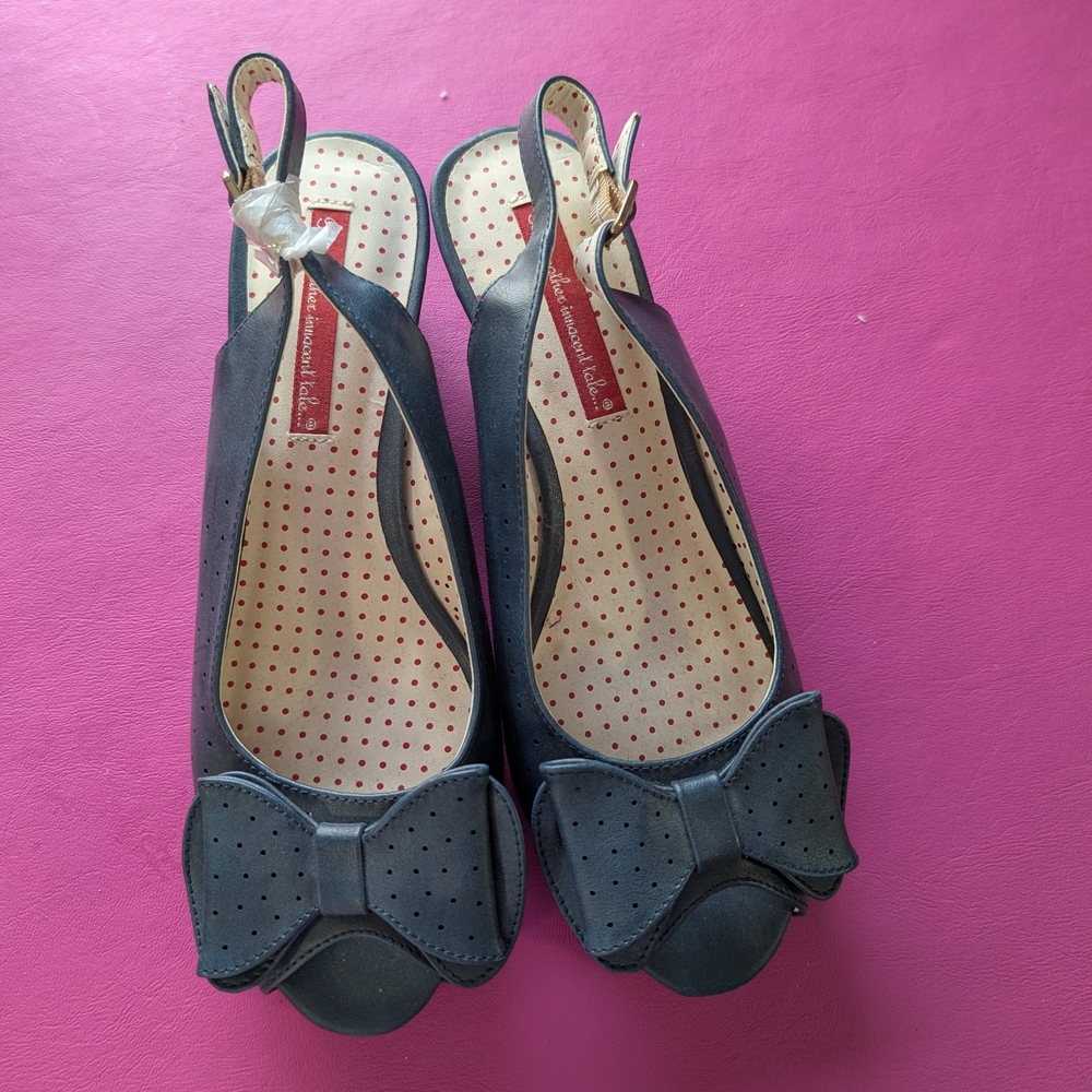 Women’s Black Bow Slingback Mules with Perforated Detail